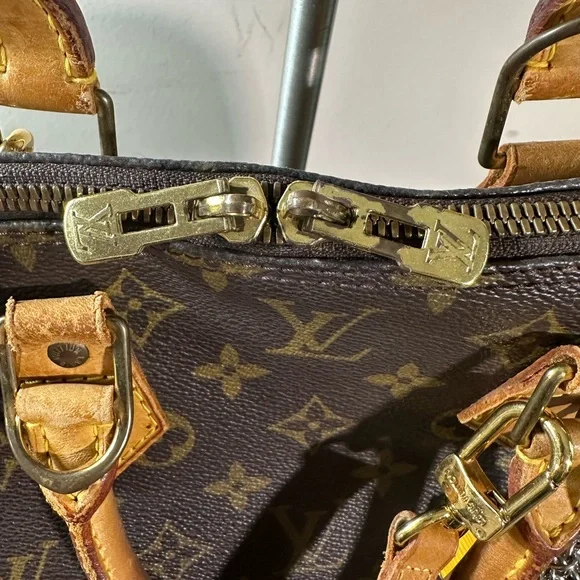 Louis Vuitton Brown and Tan Monogram with strap and keychain charm - Picture 9 of 13